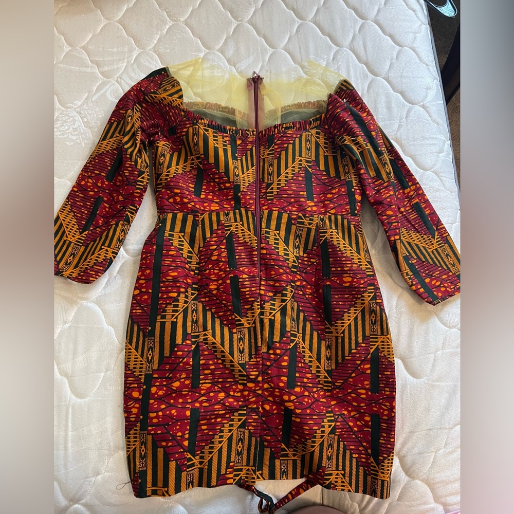 This clothes is a mini African dress suitable for women,  available